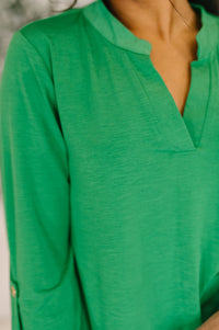 Kelly green Lizzy top by Ave Shops, a stylish blouse with a relaxed fit and lightweight fabric, shown on a model.