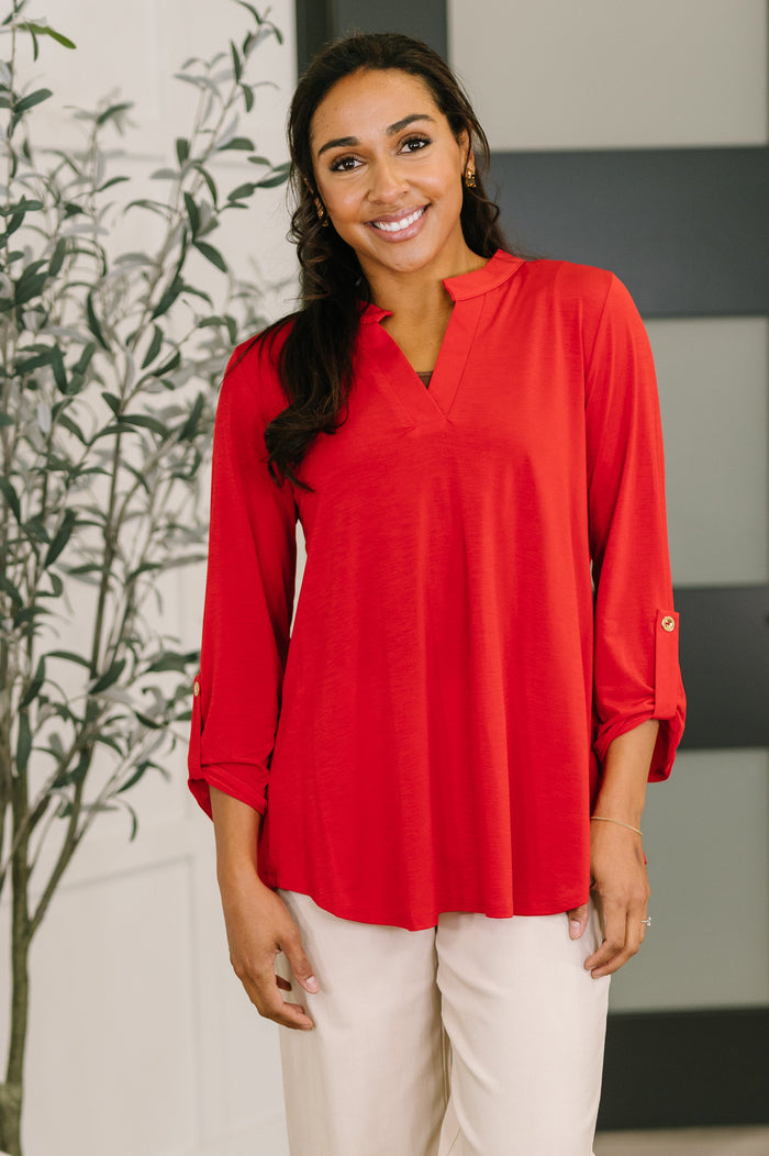 Red Lizzy top blouse from Ave Shops featuring a stylish, fitted design with long sleeves and a round neckline.