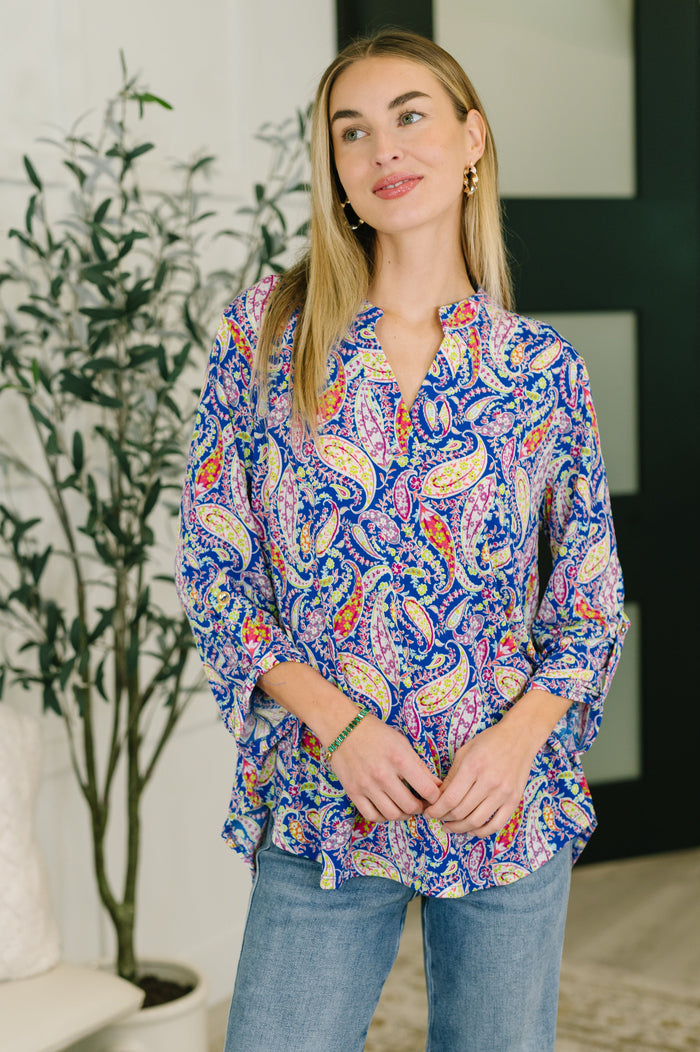 Lizzy Top in royal blue paisley print, stylish blouse from Ave Shops, featuring a flowy design and vibrant pattern.