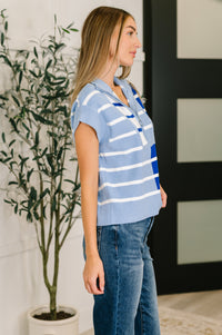Blue striped Lonely Traveler quarter zip vest for women, casual outerwear with a high collar and front zipper detail.