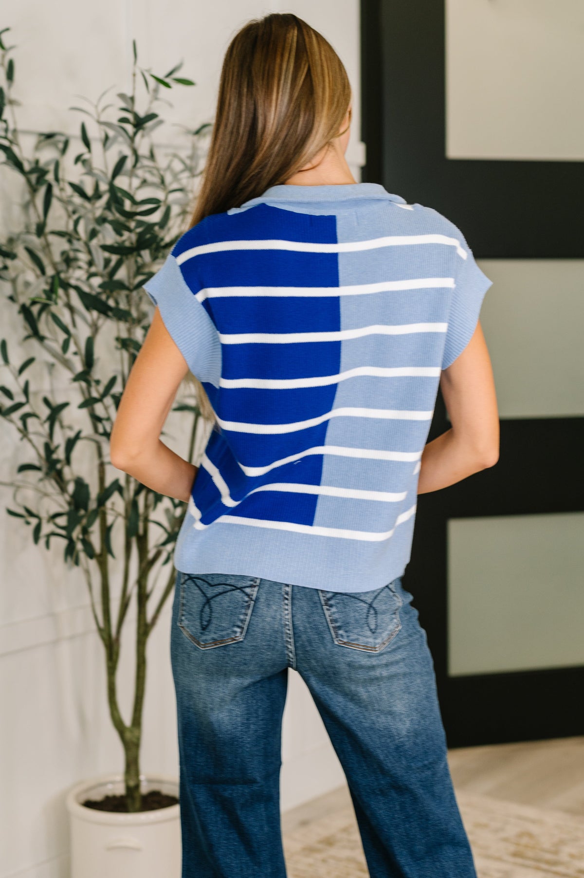 Blue Lonely Traveler striped quarter zip vest for women, lightweight outerwear with a cozy, casual style.
