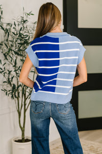 Blue Lonely Traveler striped quarter zip vest for women, lightweight outerwear with a cozy, casual style.