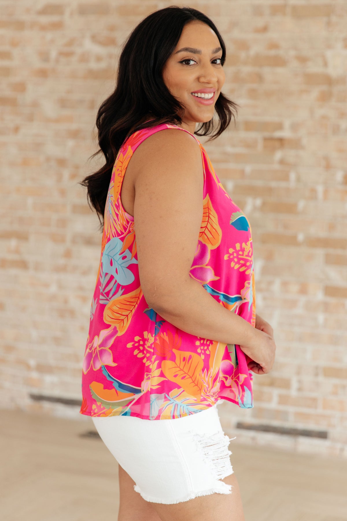 Floral sleeveless blouse by Ave Shops featuring a feminine design, lightweight fabric, and a stylish fit perfect for casual wear.