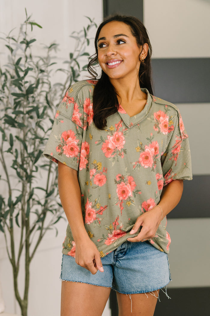 Floral V-neck blouse from Ave Shops featuring a colorful butterfly and flower print, lightweight and stylish for casual wear.
