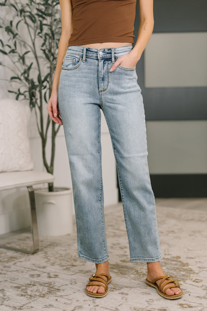 Light blue high waist ankle straight jeans from Ave Shops' Natalie collection, showing the fit and classic denim texture.