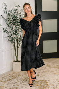 Black pinstripe V-neck dress with ruffle sleeves from Ave Shops, featuring a stylish and elegant design.