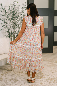 Light blue Precisely Me smock midi dress from Ave Shops, displayed on a hanger with a relaxed fit and flowing fabric.