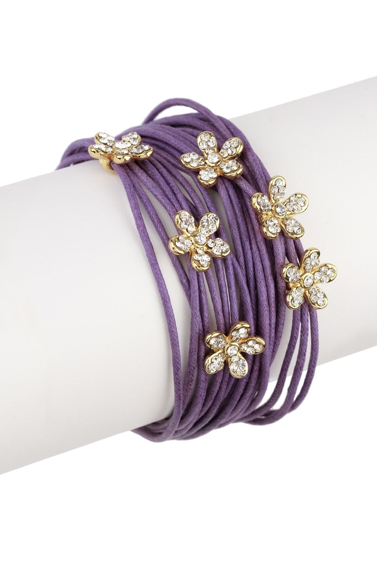 Leather bracelet with flower charm from SAACHI, featuring a stylish string design and delicate floral accents.