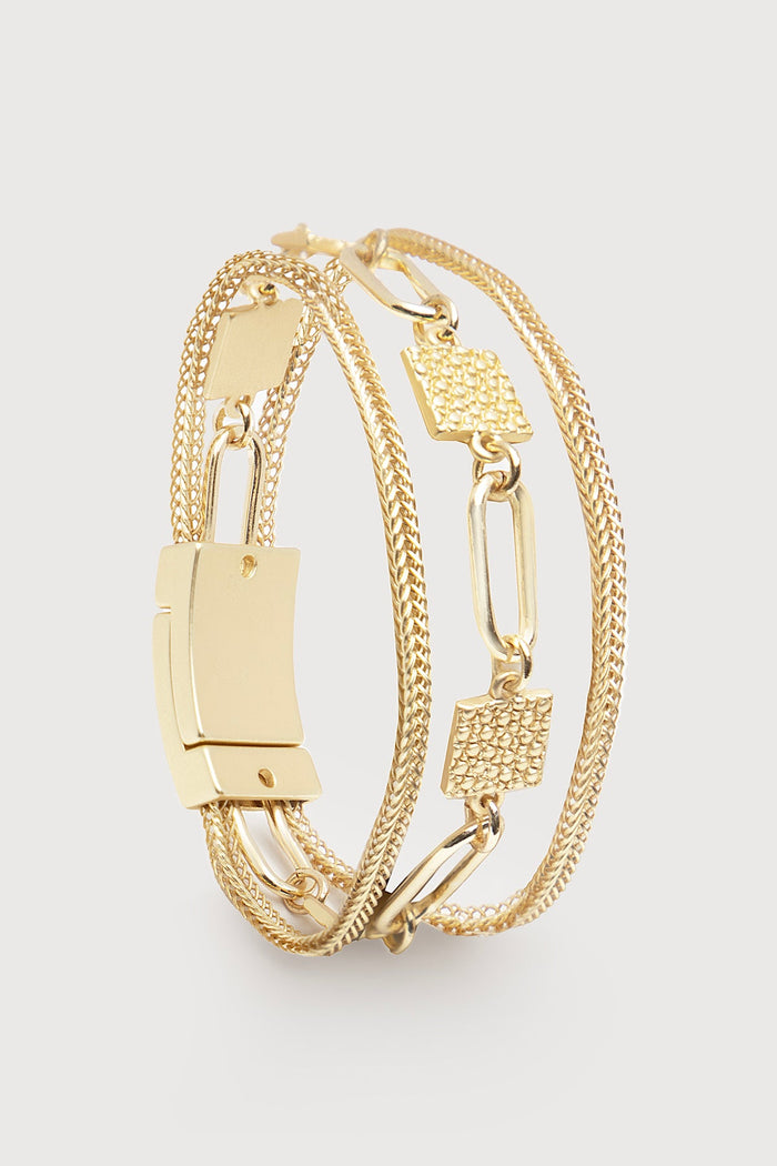 Hammered gold chain link bracelet by SAACHI featuring a textured design and secure clasp, stylish jewelry accessory.
