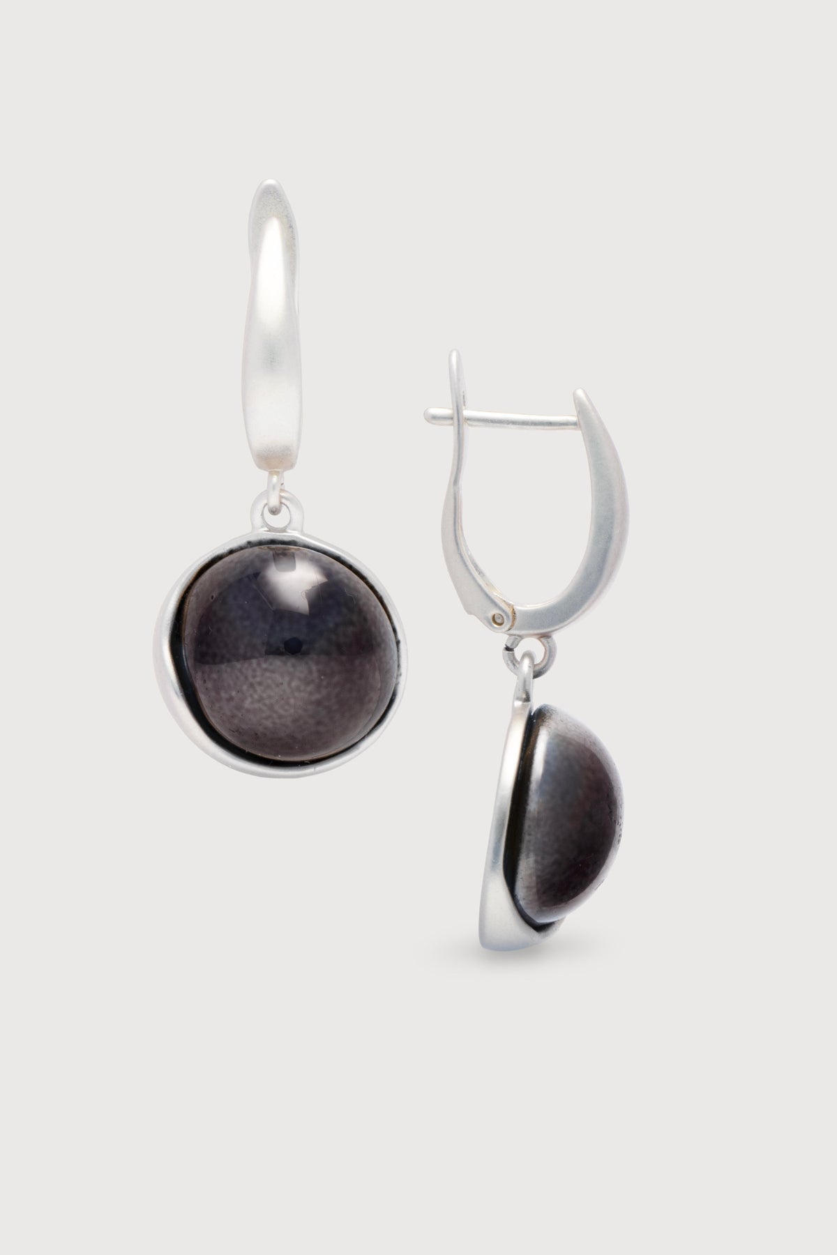 Colorful glass orb dangle earrings from SAACHI featuring vibrant glass beads and elegant earring hooks.