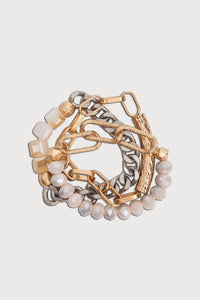 SAACHI metallic beaded chain trio bracelet with layered design, featuring shiny beads and delicate links.