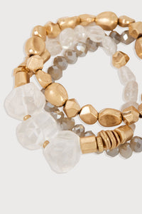 Beaded Cressa Bracelet Set by SAACHI featuring multiple stylish beaded bracelets on a neutral background.