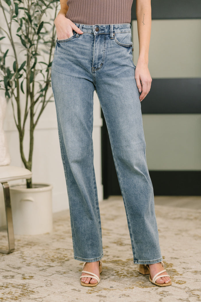 Slim straight Sabrina high waist jeans by Ave Shops, showing the dark denim fabric and classic five-pocket design.