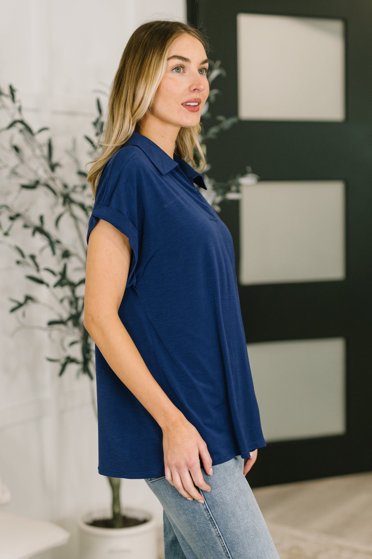 Navy Sea You Soon collared blouse in soft fabric, featuring a classic fit and button-down front, styled with long sleeves.