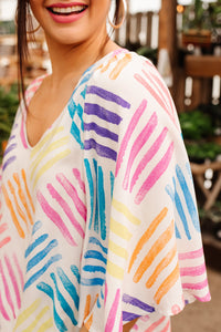 Light blue stamped blouse from Ave Shops' Stamped By Love collection, featuring a stylish design and casual fit.