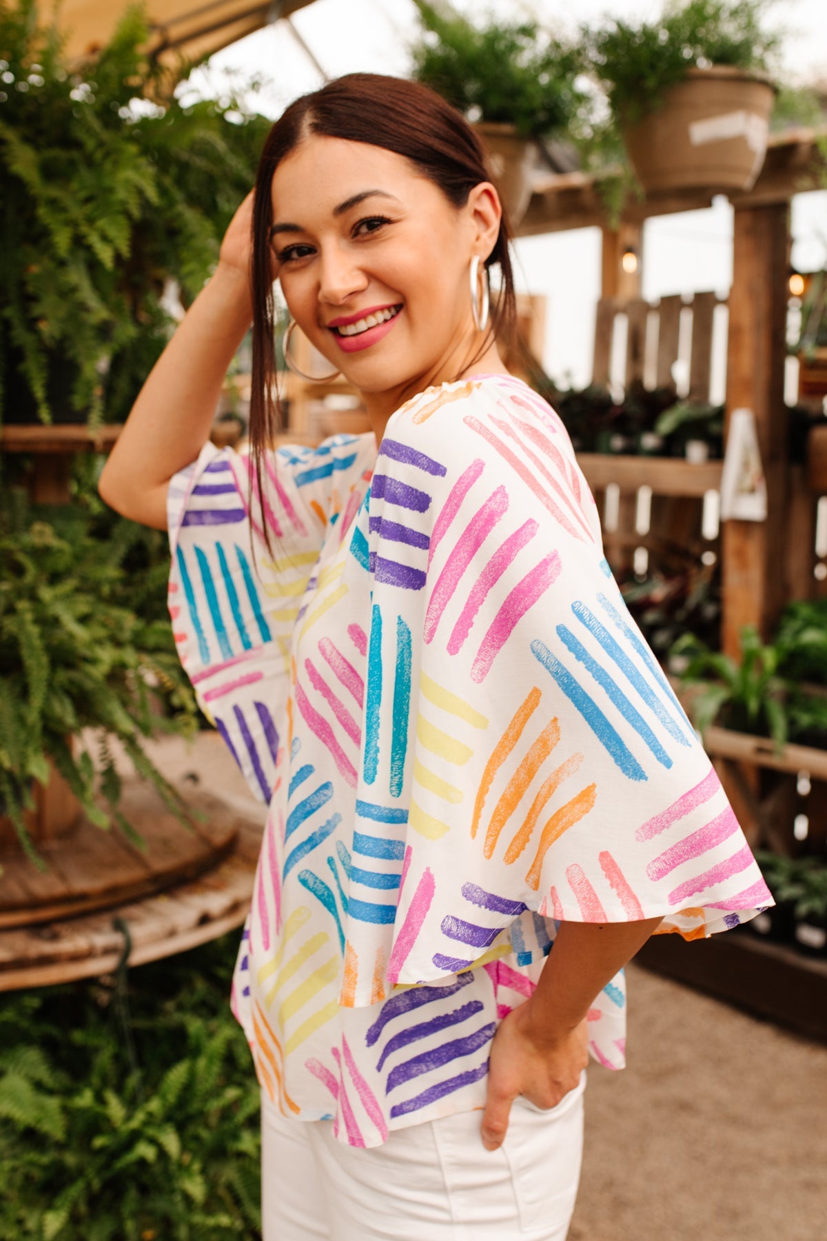 Light blue Stamped By Love blouse from Ave Shops, featuring a stamped design, long sleeves, and a relaxed fit.