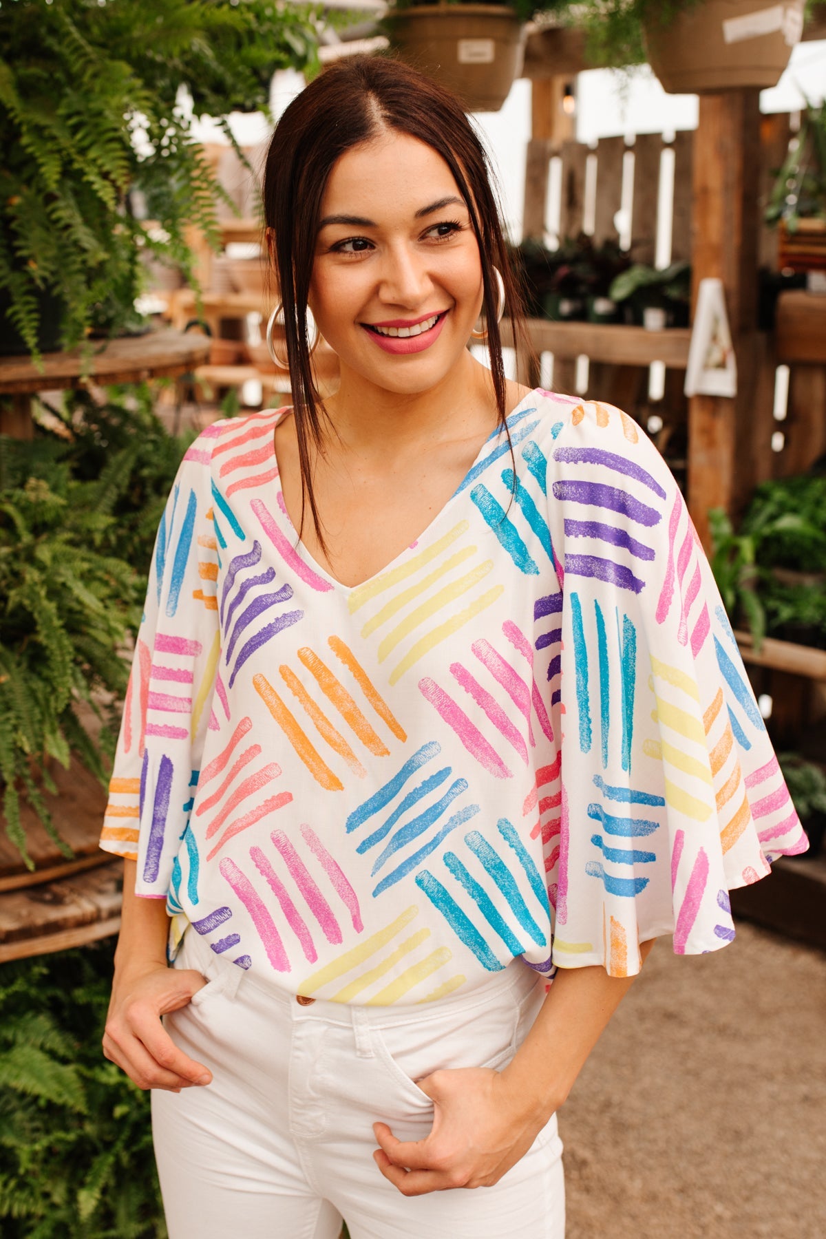 Black Stamped By Love blouse from Ave Shops featuring a stylish stamped design, long sleeves, and a relaxed fit.