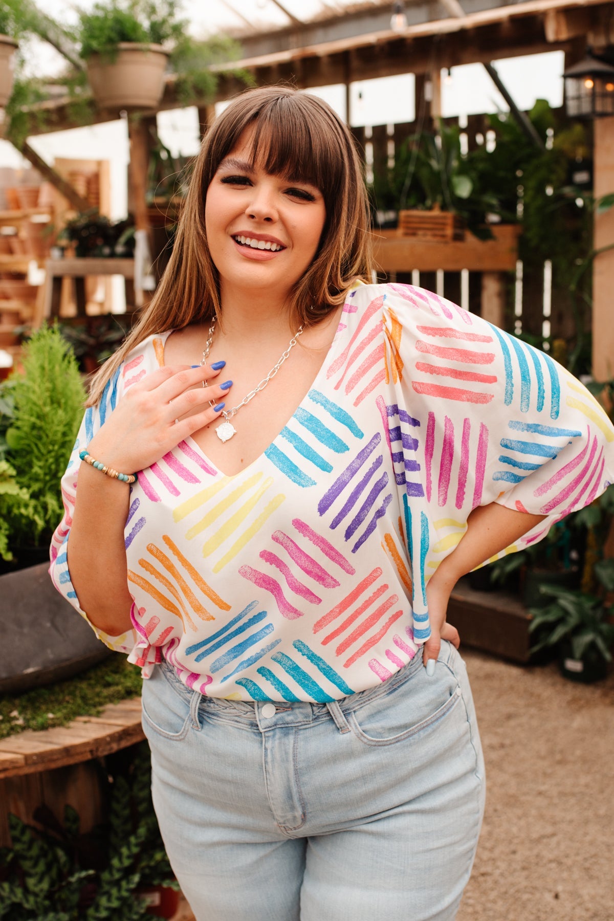 Light blue Stamped By Love top blouse from Ave Shops featuring stamped design and relaxed fit, laid flat on a white surface.