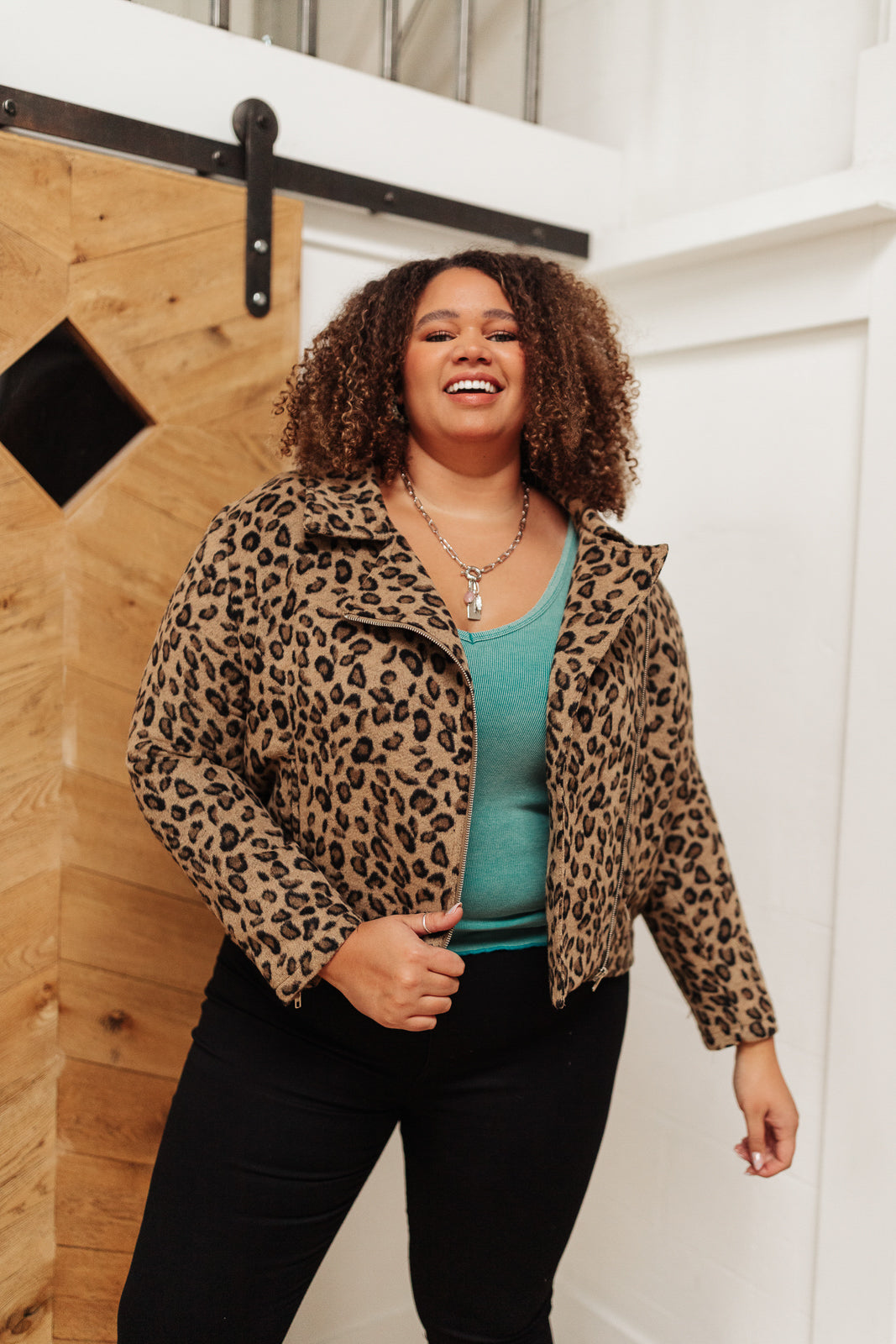 Aqua-colored Stay Easy tank top from Ave Shops, made of lightweight fabric, featuring a sleeveless design and relaxed fit.