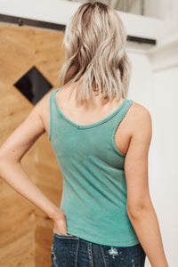 Aqua Stay Easy Tank top from Ave Shops, lightweight sleeveless blouse with a relaxed fit, displayed on a hanger.