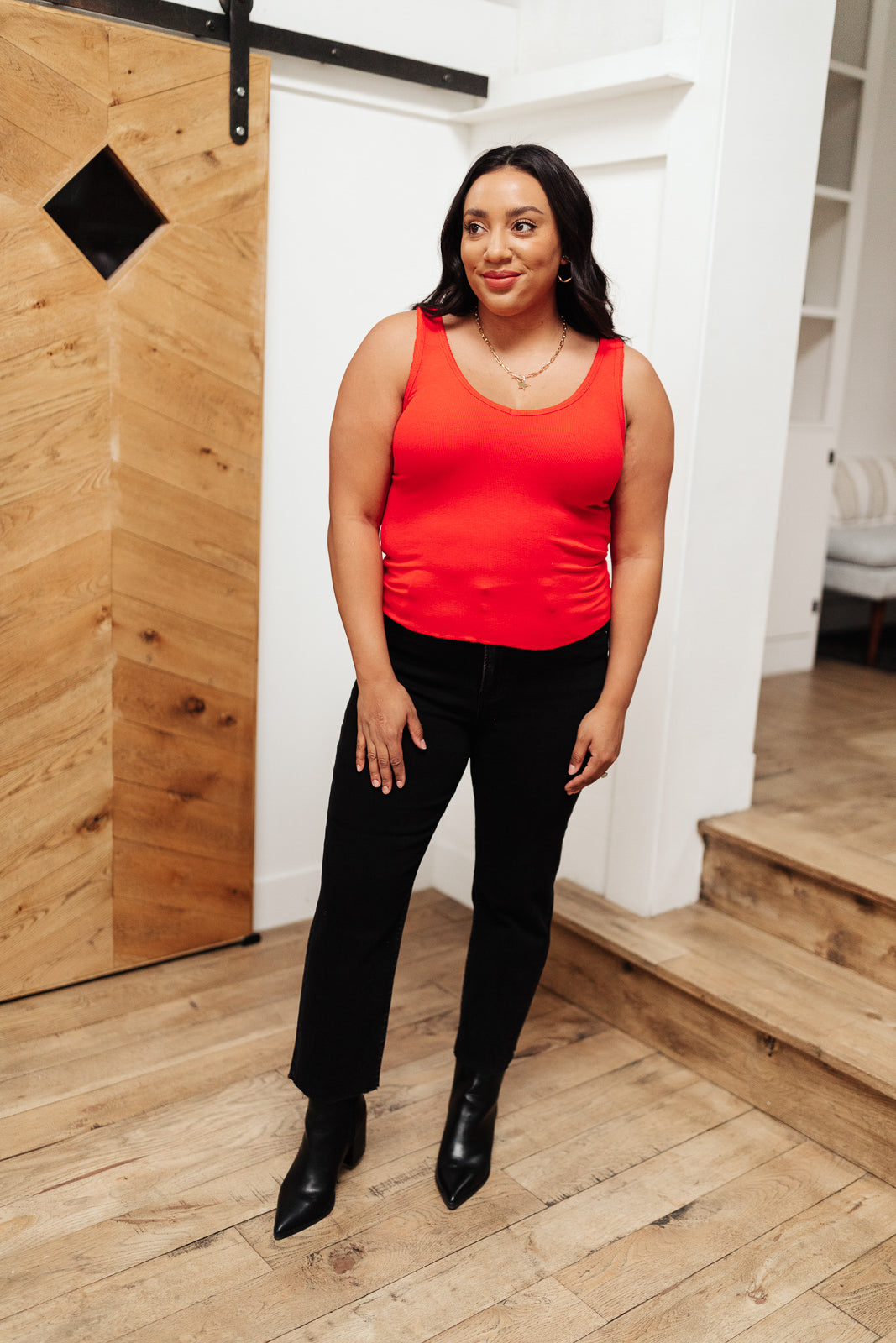 Red Stay Easy tank top from Ave Shops, a casual sleeveless blouse with a relaxed fit and simple design.