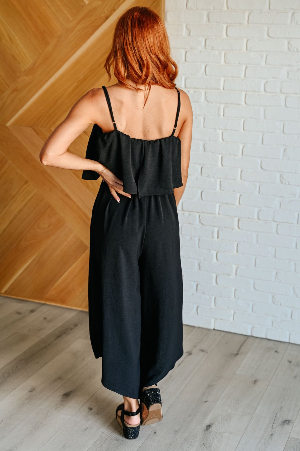 Cream-colored spaghetti strap jumpsuit from Ave Shops featuring a fitted bodice and wide-leg pants, perfect for casual wear.