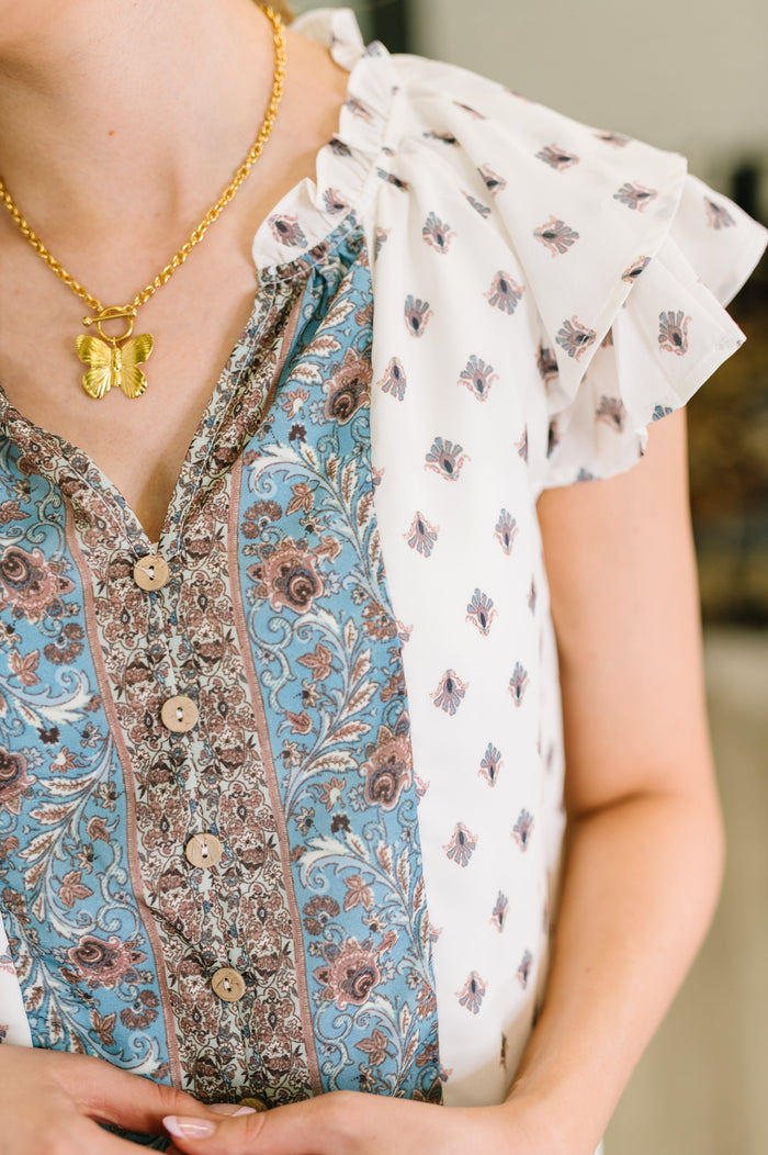 Willow Breeze short sleeve blouse by Ave Shops, soft fabric with a relaxed fit, featuring a floral pattern and button-front design.