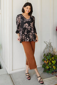 V-neck floral blouse from Ave Shops featuring a colorful floral pattern and lightweight fabric.