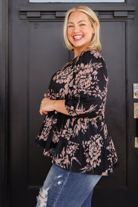 V-neck floral blouse from Ave Shops featuring a colorful floral pattern and lightweight fabric, perfect for casual wear.