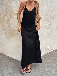 V-neck maxi cami dress by Trendsi, flowing sleeveless dress with a relaxed fit, perfect for casual or summer wear.