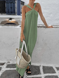 Elegant black halter neck maxi dress by Trendsi featuring flowing fabric and a fitted bodice for stylish evening wear.