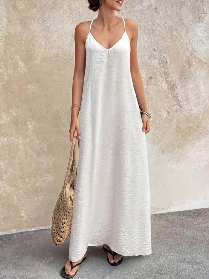 V-Neck Maxi Cami Dress from Trendsi, featuring a flowy silhouette and sleeveless design, perfect for summer or casual wear.