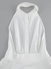 Backless button-front maxi dress by Trendsi featuring a flowing silhouette and open back, perfect for elegant summer occasions.