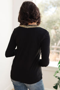 Top de manga larga con cuello en V y forro brillante