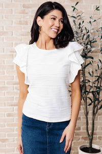 Blusa con mangas con volantes de Highest Praise