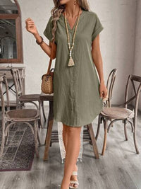 Casual button-down short sleeve dress by Trendsi, featuring a relaxed fit and lightweight fabric, perfect for everyday wear.