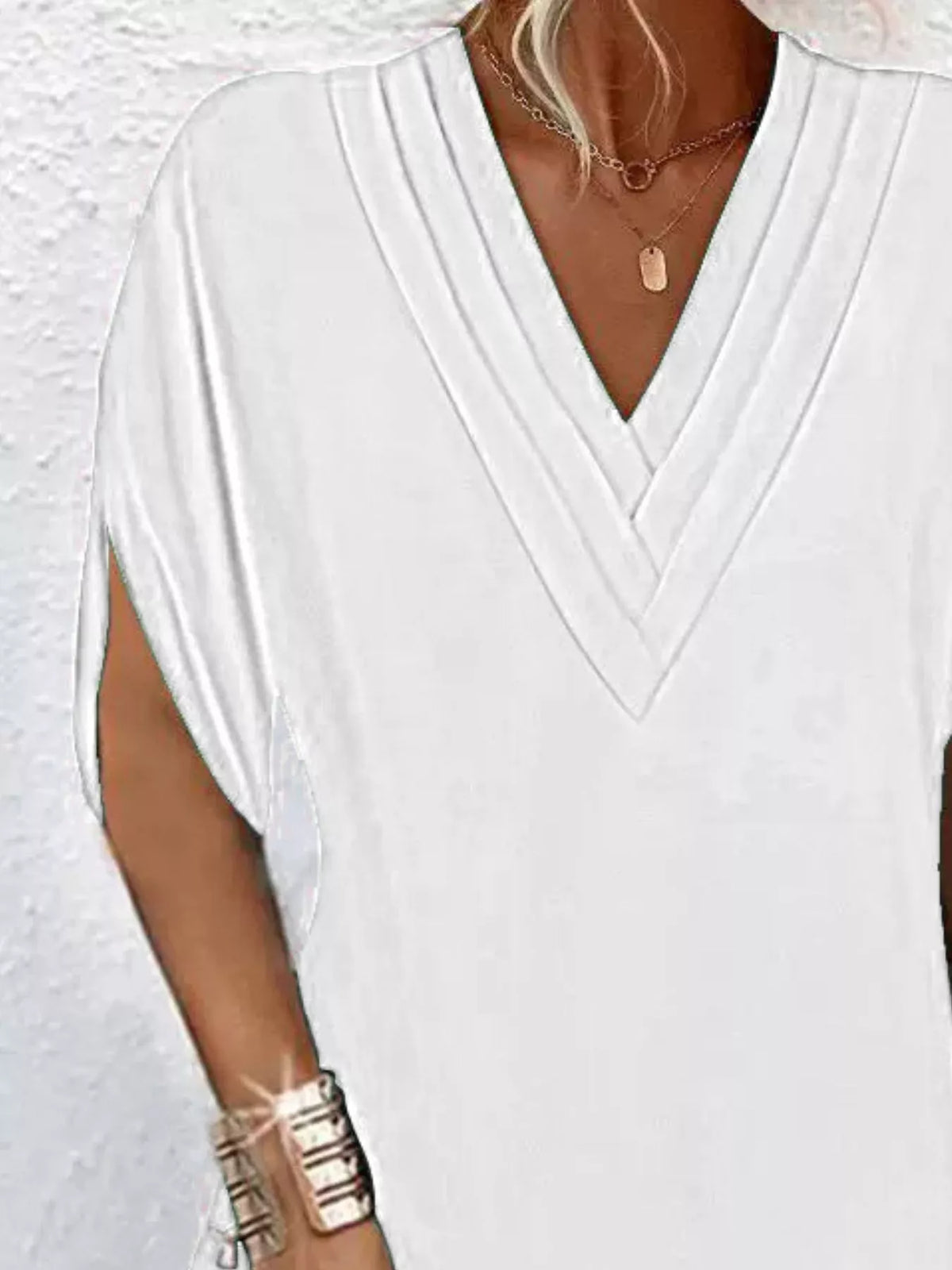 Plus size Trendsi full size V-neck mini dress with slit sleeves, featuring a stylish and elegant design.