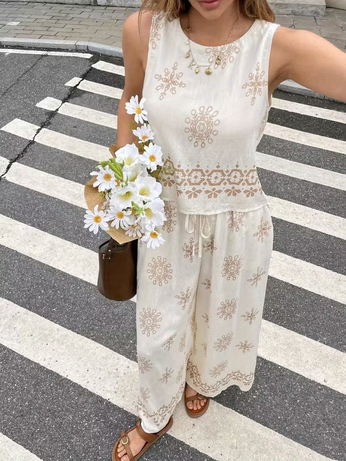 Trendsi sleeveless top and wide-leg pants two-piece set displayed on a model, featuring a stylish, casual outfit.