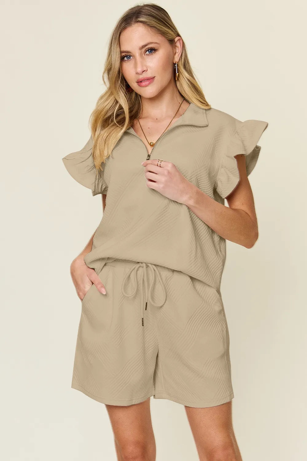 Trendsi double take texture flounce sleeve top and drawstring shorts two-piece set, stylish casual outfit with textured fabric.