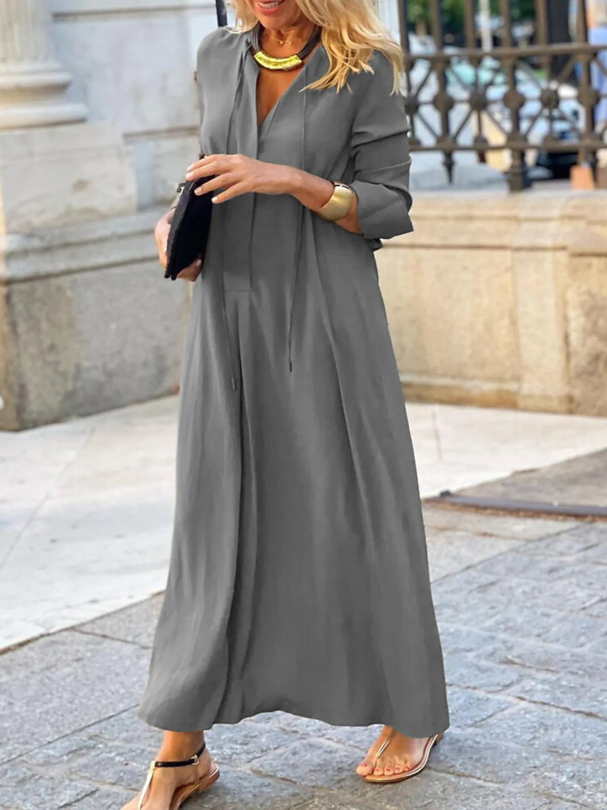 Trendsi solid color maxi shirt dress with button-down front and relaxed fit, displayed on a mannequin.