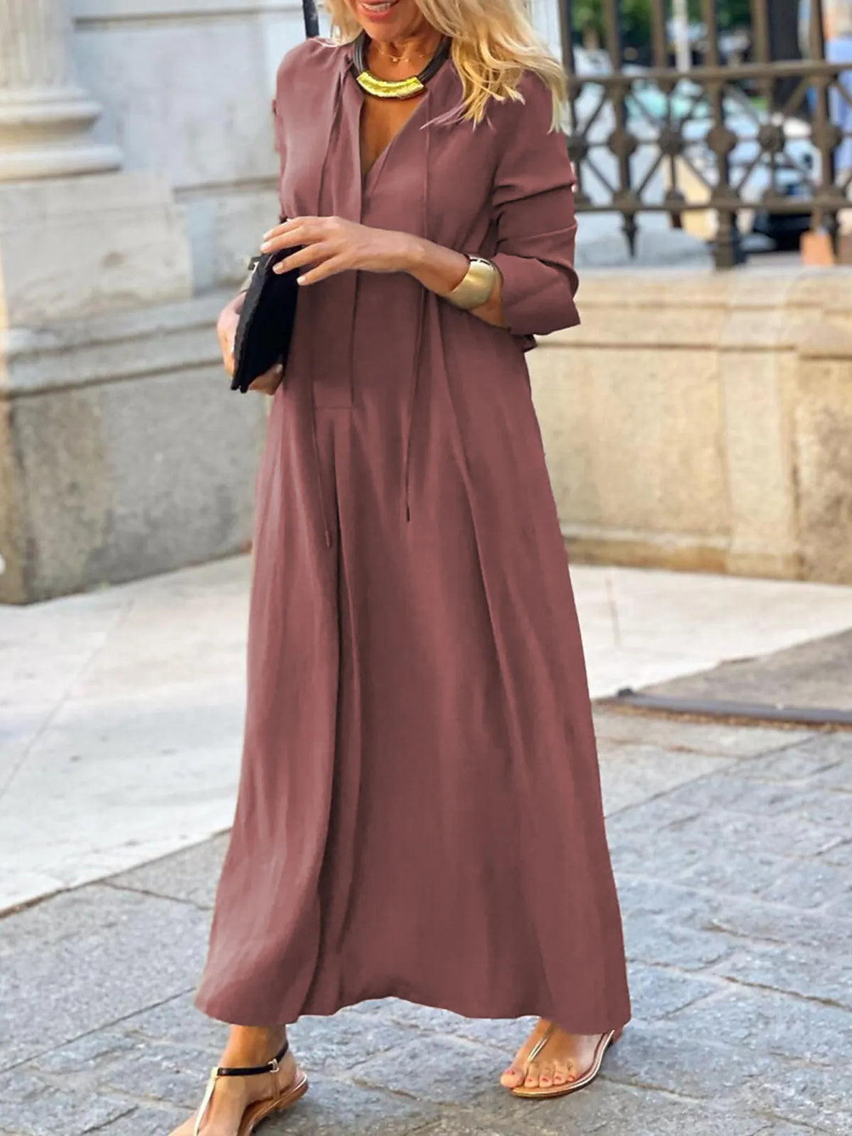 Trendsi solid color maxi shirt dress featuring a relaxed fit and button-down front, perfect for casual or semi-formal wear.