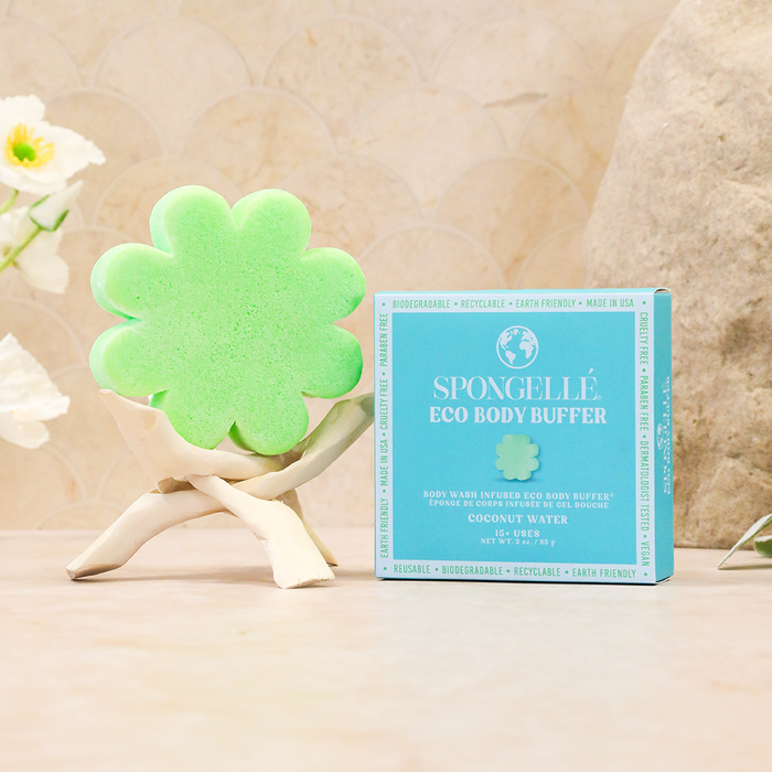 Spongellé coconut water body buffer, a body wash-infused buffer with a lush coconut water scent, showing the textured sponge.