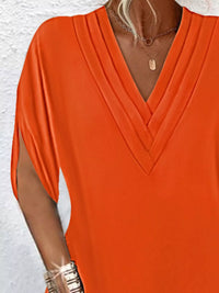 Plus size Trendsi full size V-neck mini dress with slit sleeves, featuring a stylish and flattering design.