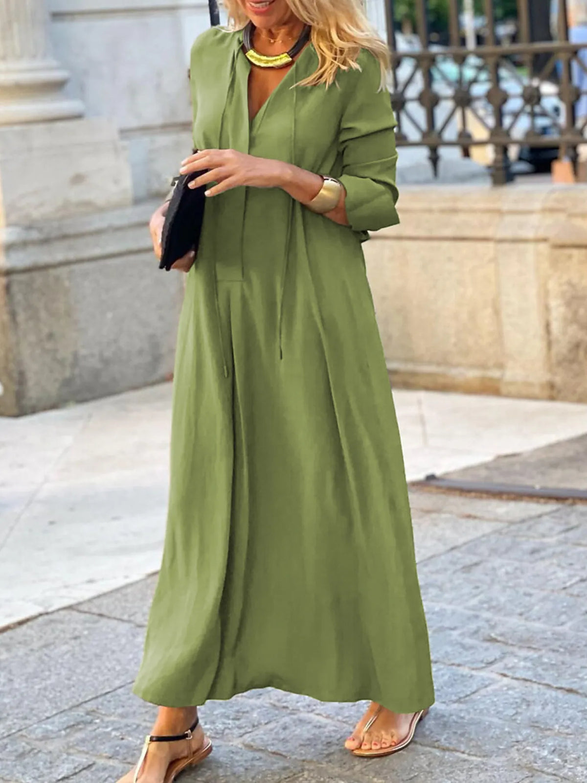 Trendsi solid color maxi shirt dress featuring a relaxed fit and button-down design, perfect for casual outings.