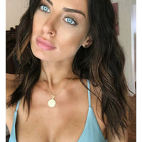 Collar con moneda del emperador