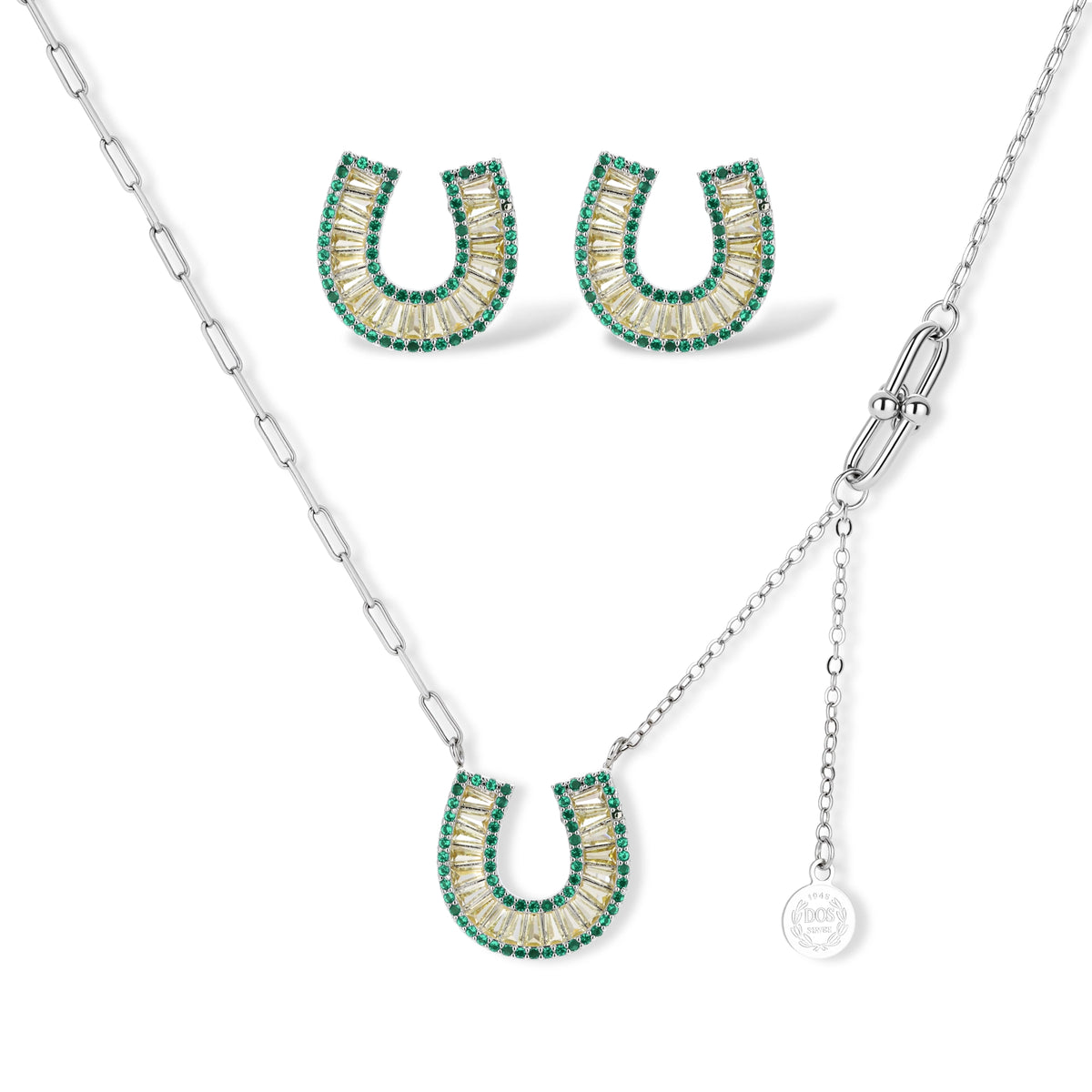 Sparkling horseshoe-shaped jewelry set with AAA cubic zirconia in gold-plated and white gold finishes on cream background.