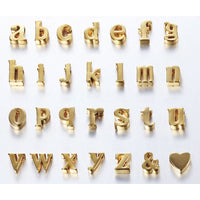 Mini initial necklace by Sahira Jewelry Design featuring a delicate pendant with a personalized initial on a fine chain.