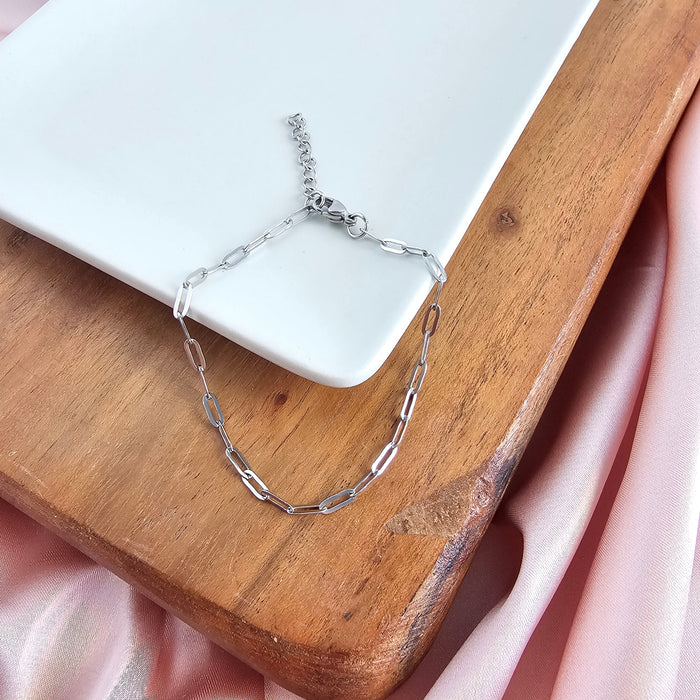 Delicate silver paper clip bracelet by Spiffy & Splendid, featuring minimalist design and refined metal links.