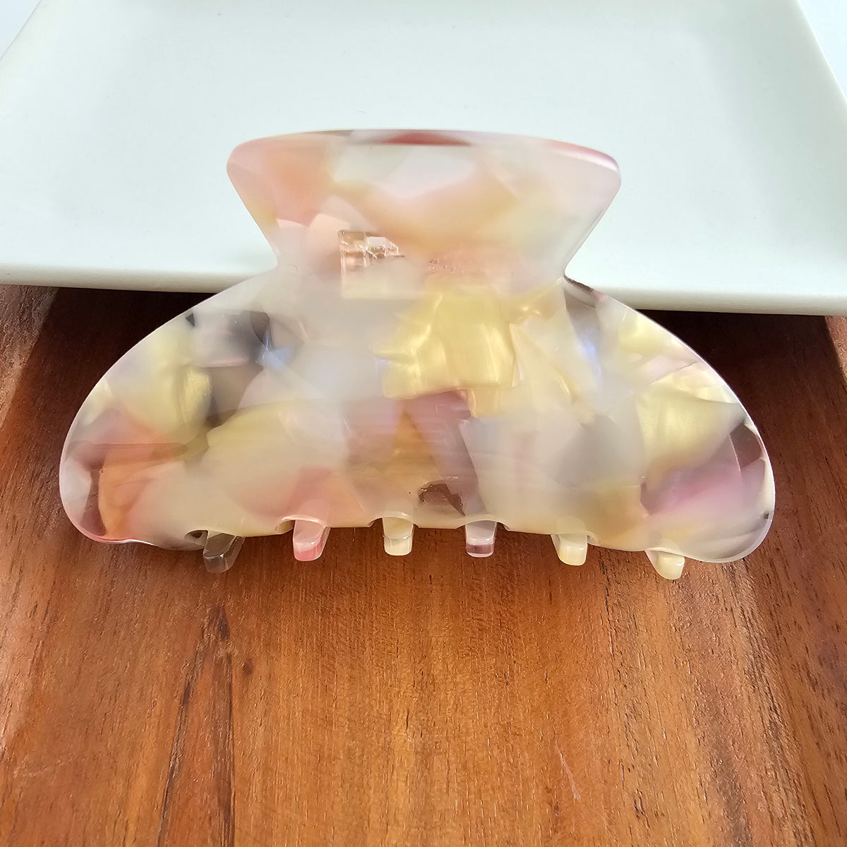 Spiffy & Splendid Candace Hair Claw in Spring Spritz, a stylish hair accessory with a sleek, curved claw design for easy hair styling.