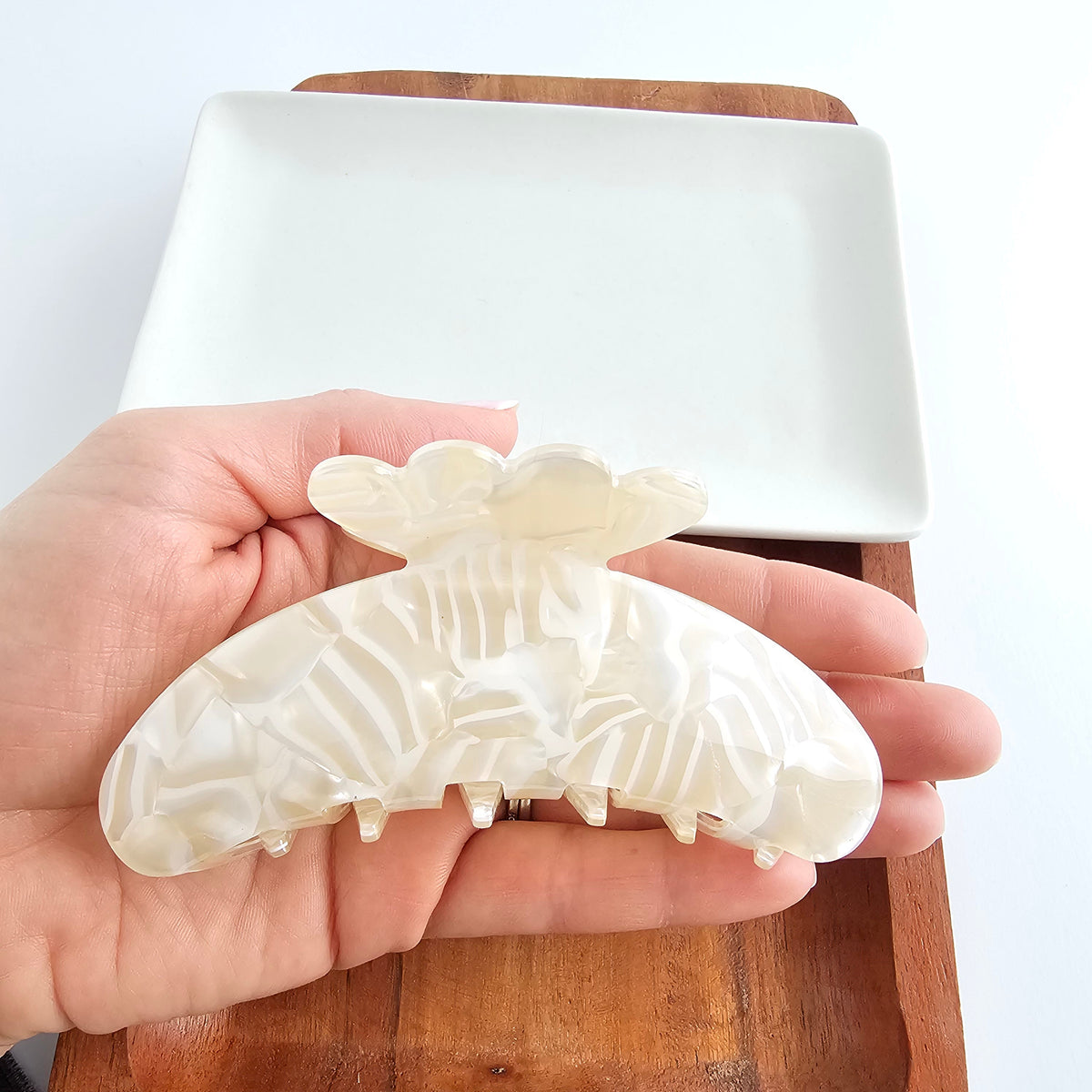 Ivory Brielle Hair Claw by Spiffy & Splendid, a stylish hair accessory with a secure claw clip for versatile styling.